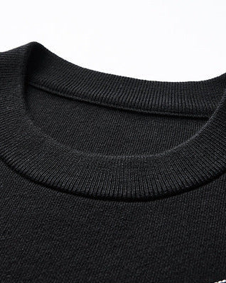 The Mo Maike “Zen Stitch” Sweater