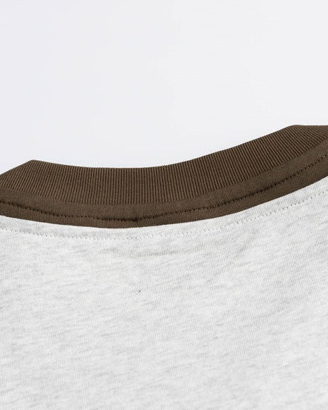 The Sandwashed Button Embellishment Polo Shirt